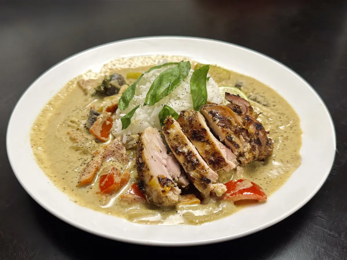 A bowl of fragrant green curry